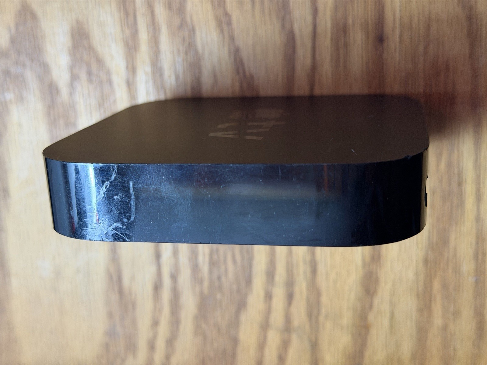 Apple TV 3rd Gen A1469. JUST TV. no remote no power cable. turns on. SOLD AS IS.